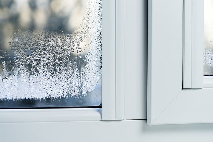 Double-glazed windows with thermal profiling